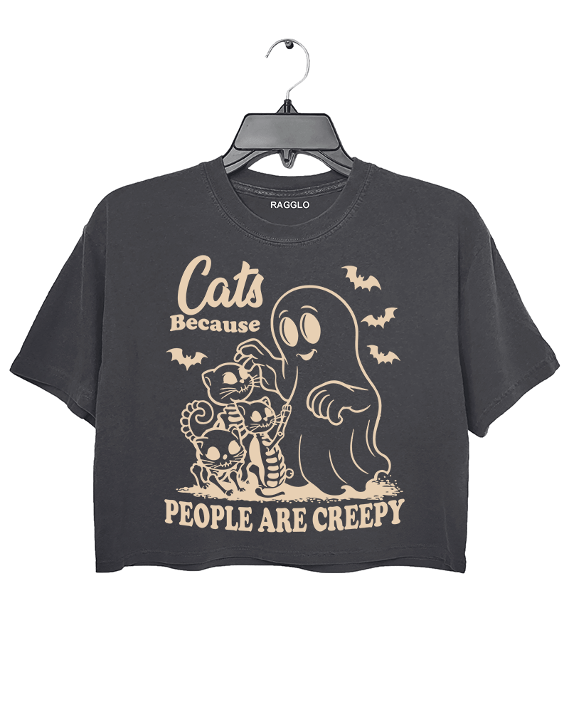Ragglo dark gray crop top featuring a ghost and three skeleton cats with bats and 'CATS BECAUSE PEOPLE ARE CREEPY' text, perfect for funny Halloween streetwear and cat lovers.