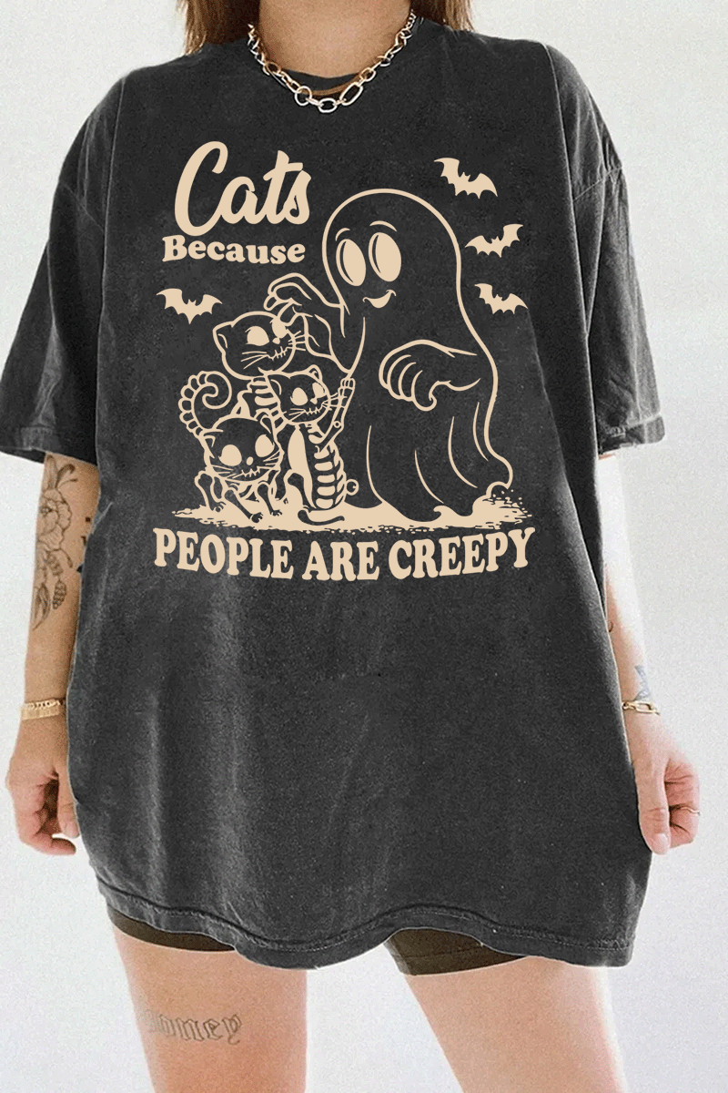 Ragglo dark gray tee featuring a ghost and three skeleton cats with bats and 'CATS BECAUSE PEOPLE ARE CREEPY' text, perfect for funny Halloween streetwear and cat lovers.