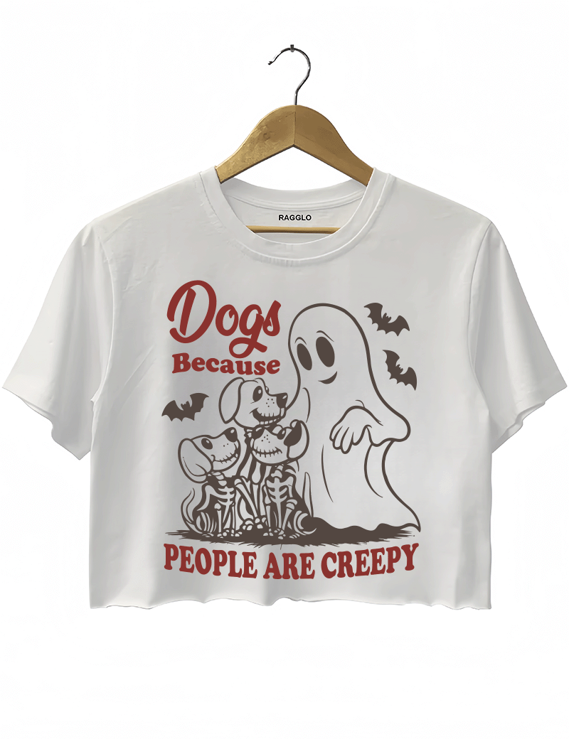 Ragglo white women's crop top featuring three skeleton dogs, a playful ghost, and bats with the humorous text 'Dogs Because People Are Creepy' in a spooky design.