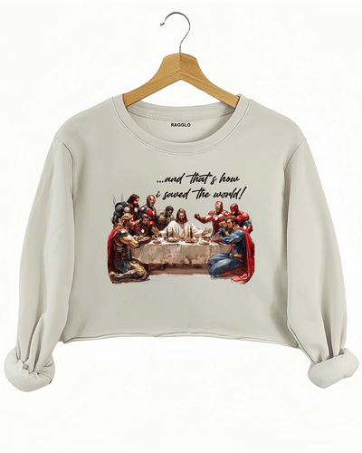 Ragglo beige women's crop sweatshirt featuring superheroes in a Last Supper scene with text "...and That's how I saved the world!"