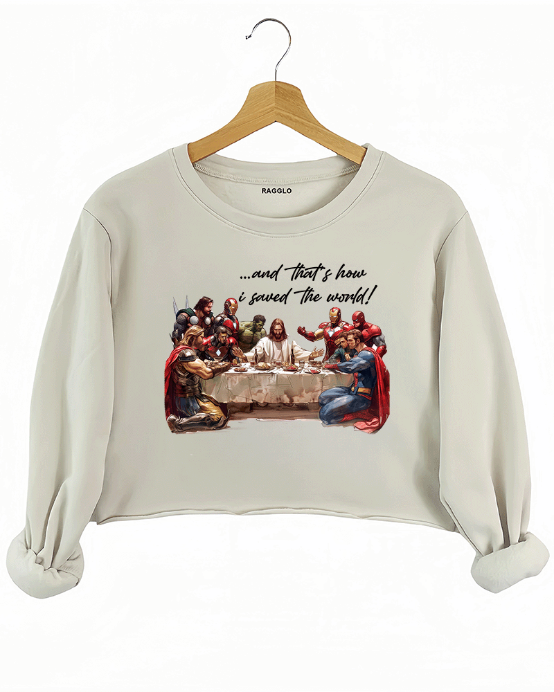 Ragglo beige women's crop sweatshirt featuring superheroes in a Last Supper scene with text "...and That's how I saved the world!"