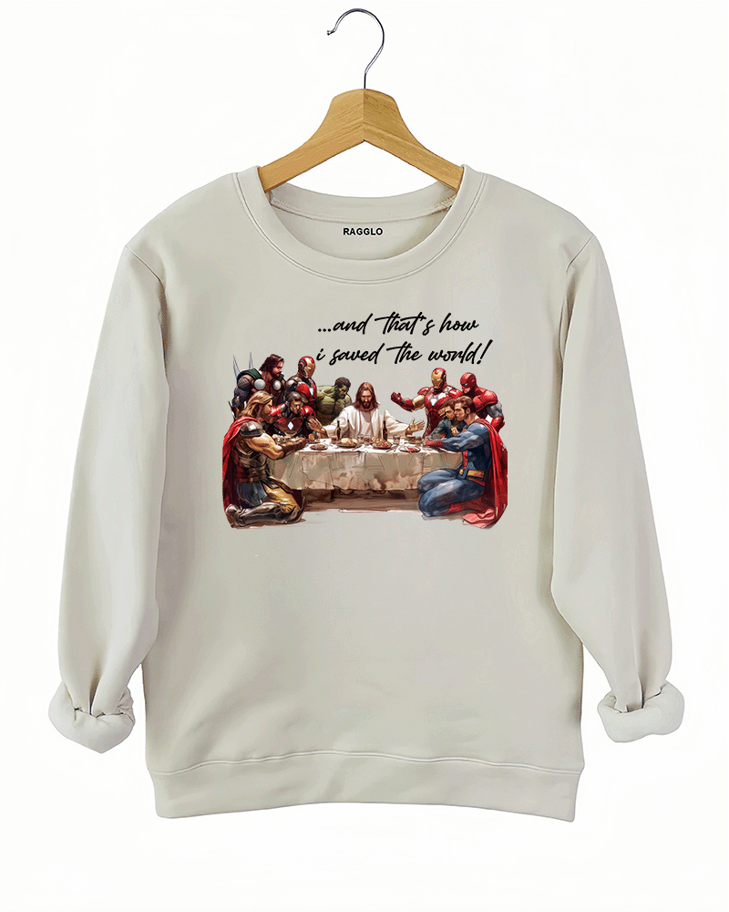Ragglo beige women's sweatshirt featuring superheroes in a Last Supper scene with text "...and That's how I saved the world!"