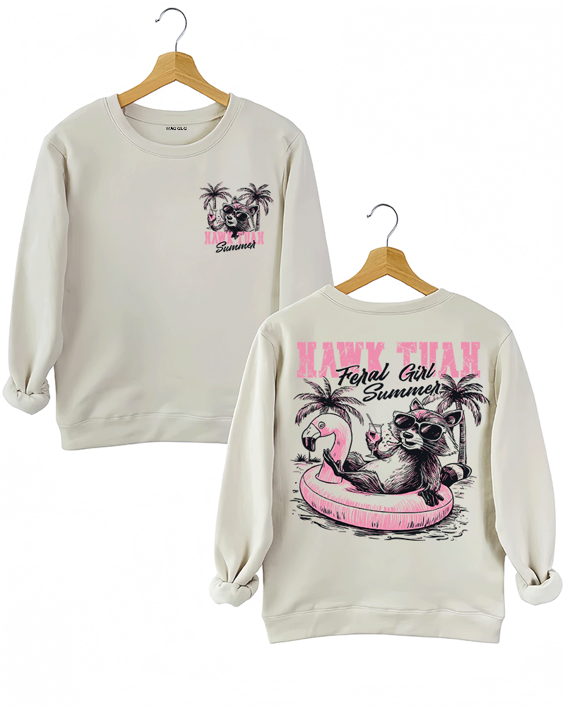 Ragglo beige sweatshirt front and back view, featuring a raccoon in sunglasses on a flamingo float with 'HAWK TUAH FERAL GIRL SUMMER' text and palm trees, perfect for playful vacation streetwear.