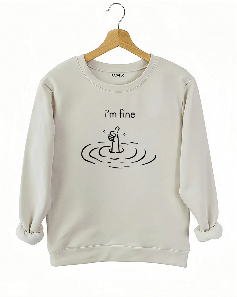 Ragglo beige sweatshirt featuring 'i’m fine' text with a sarcastic drowning hand graphic, perfect for mental health awareness and humorous streetwear.