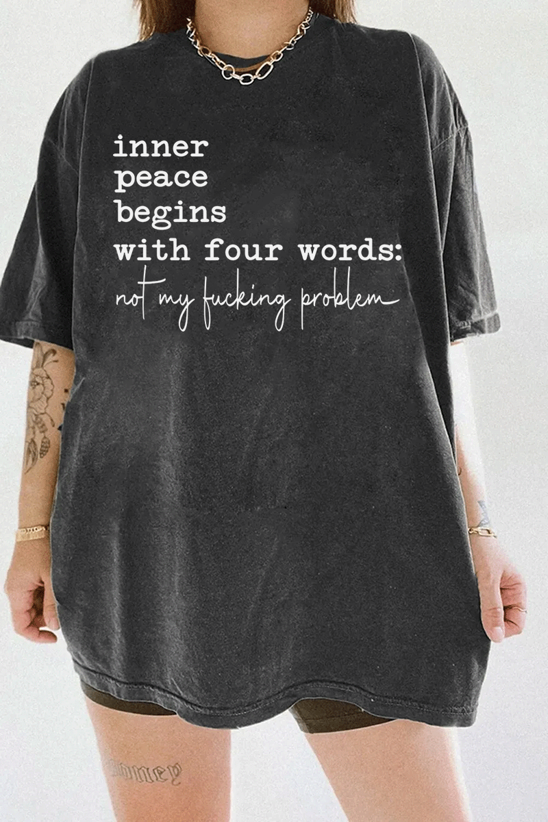 Ragglo dark gray T-shirt featuring 'inner peace begins with four words: not my f**king problem' text, perfect for sassy streetwear and carefree attitude enthusiasts.