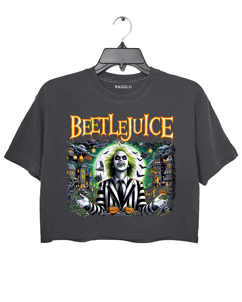 Ragglo dark gray crop top featuring Beetlejuice in a black-and-white striped suit, with a haunted house, bats, and pumpkins in the background, with 'BEETLEJUICE' text, perfect for Halloween streetwear and movie fans.