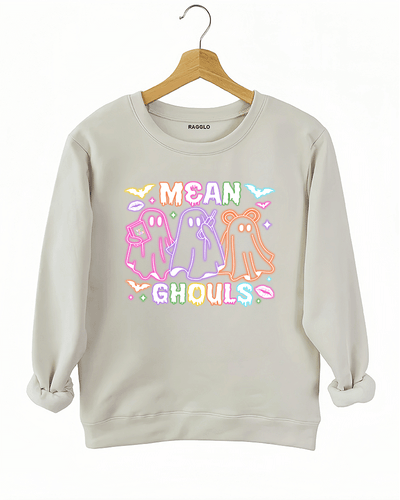 Ragglo beige sweatshirt with "Mean Ghouls" neon ghost graphic in pink, purple, and orange, featuring a playful Halloween and Mean Girls parody theme.