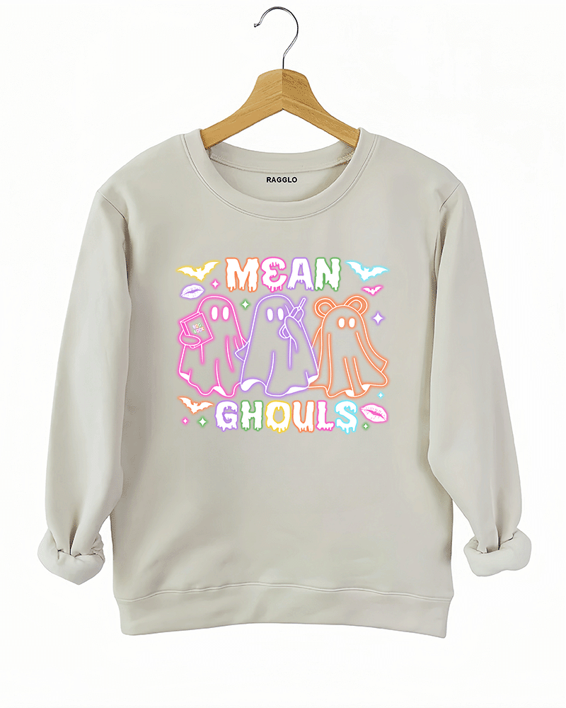 Ragglo beige sweatshirt with "Mean Ghouls" neon ghost graphic in pink, purple, and orange, featuring a playful Halloween and Mean Girls parody theme.