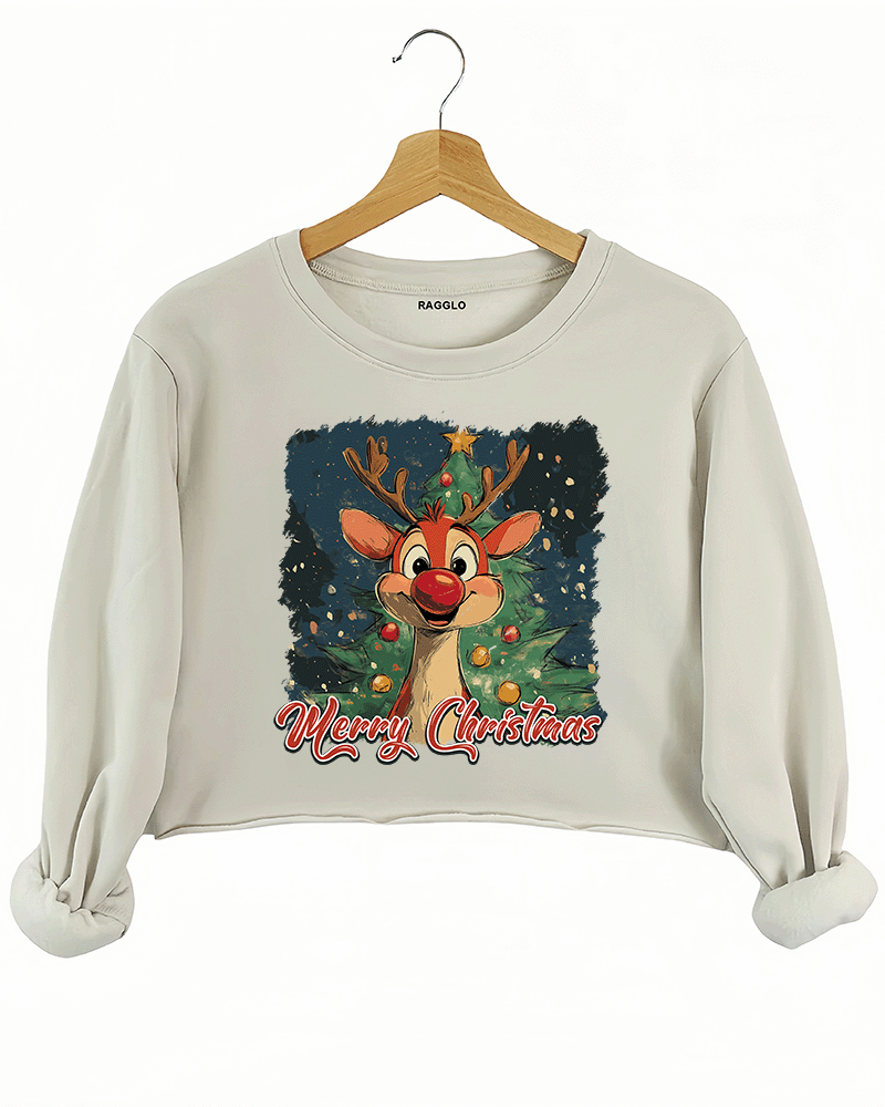 Ragglo beige crop sweatshirt featuring 'MERRY CHRISTMAS' text with a cute red-nosed reindeer, a decorated Christmas tree, and festive lights, perfect for holiday streetwear and Christmas celebrations