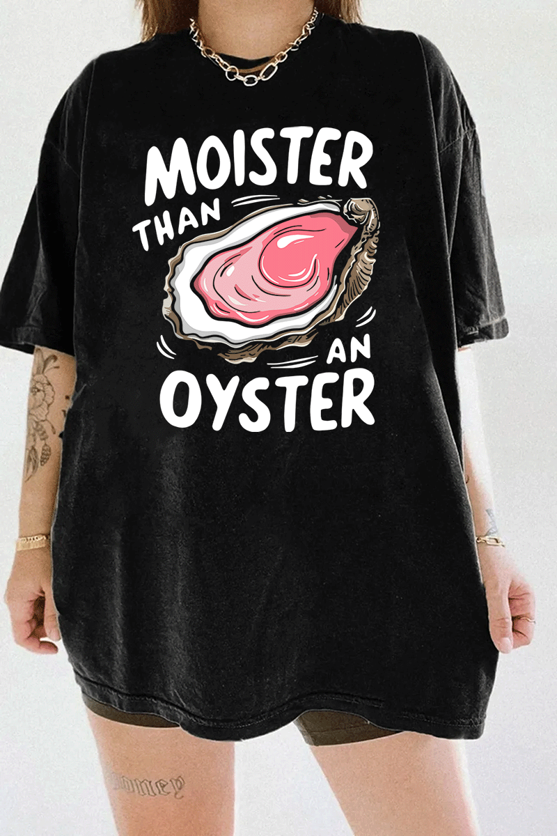 Ragglo black T-shirt featuring 'MOISTER THAN AN OYSTER' text with an oyster graphic, perfect for cheeky streetwear and playful, flirty vibes.