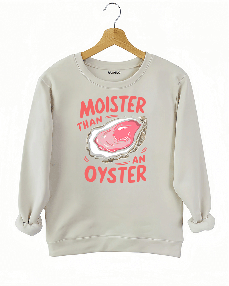 Ragglo beige sweatshirt featuring 'MOISTER THAN AN OYSTER' text with an oyster graphic, perfect for cheeky streetwear and playful, flirty vibes.