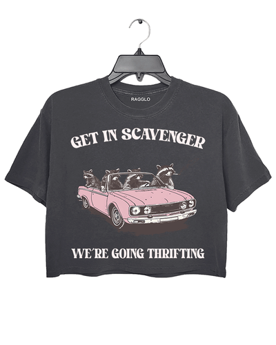 Ragglo dark gray crop top featuring raccoons in a pink convertible car, with 'GET IN SCAVENGER WE’RE GOING THRIFTING' text, perfect for funny retro streetwear for thrifting enthusiasts.