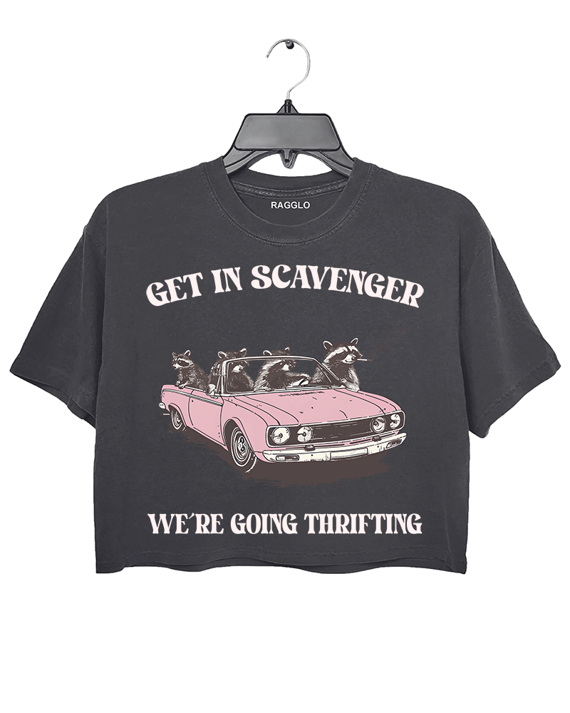 Ragglo dark gray crop top featuring raccoons in a pink convertible car, with 'GET IN SCAVENGER WE’RE GOING THRIFTING' text, perfect for funny retro streetwear for thrifting enthusiasts.