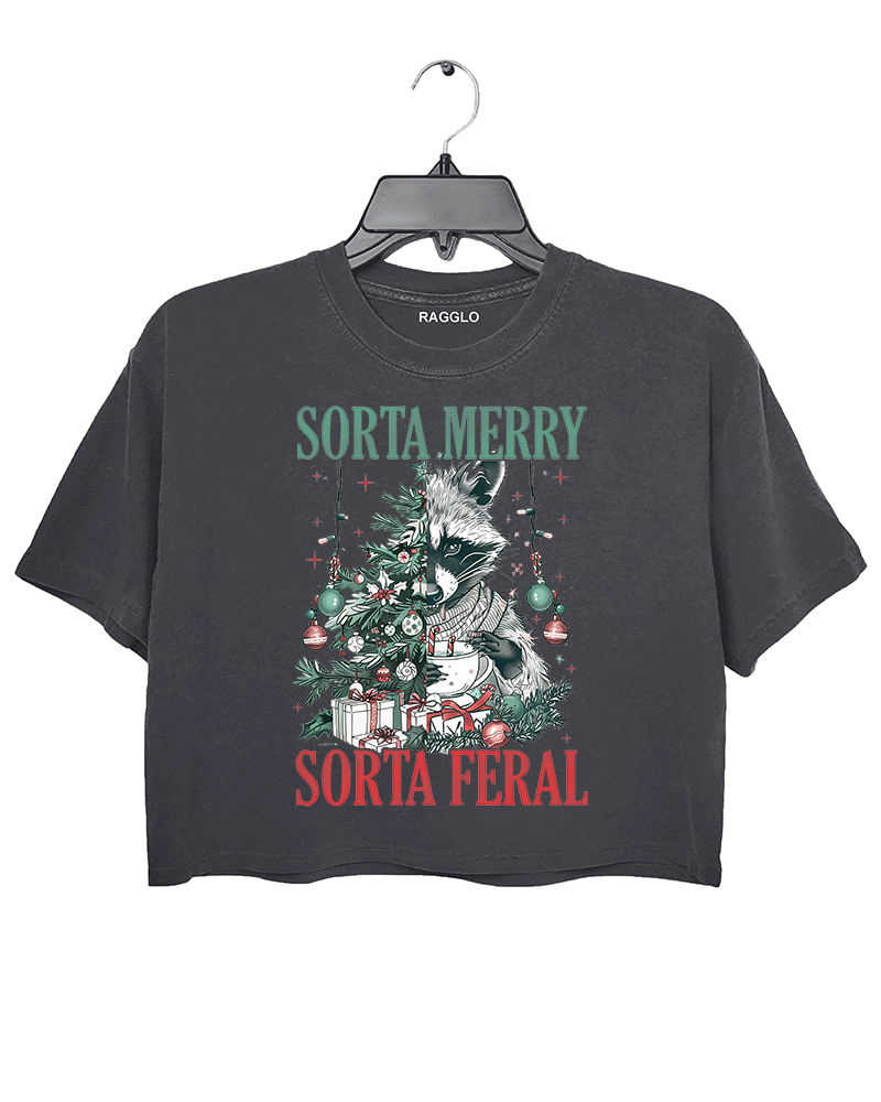 Ragglo dark gray crop top featuring a raccoon with a decorated Christmas tree, gifts, and 'SORTA MERRY SORTA FERAL' text, perfect for funny Christmas streetwear.