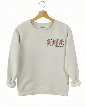 Ragglo beige women's sweatshirt front featuring three Grinch characters with Santa hats and the text 'Oh, That’s It I’m Trippin'' in a funny Christmas graphic design.