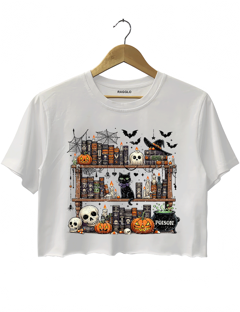 Ragglo white crop top featuring a spooky bookshelf with magic books, pumpkins, skulls, a black cat, and a 'POISON' potion bottle, accented by bats and spiderwebs, perfect for Halloween streetwear and witchy vibes.