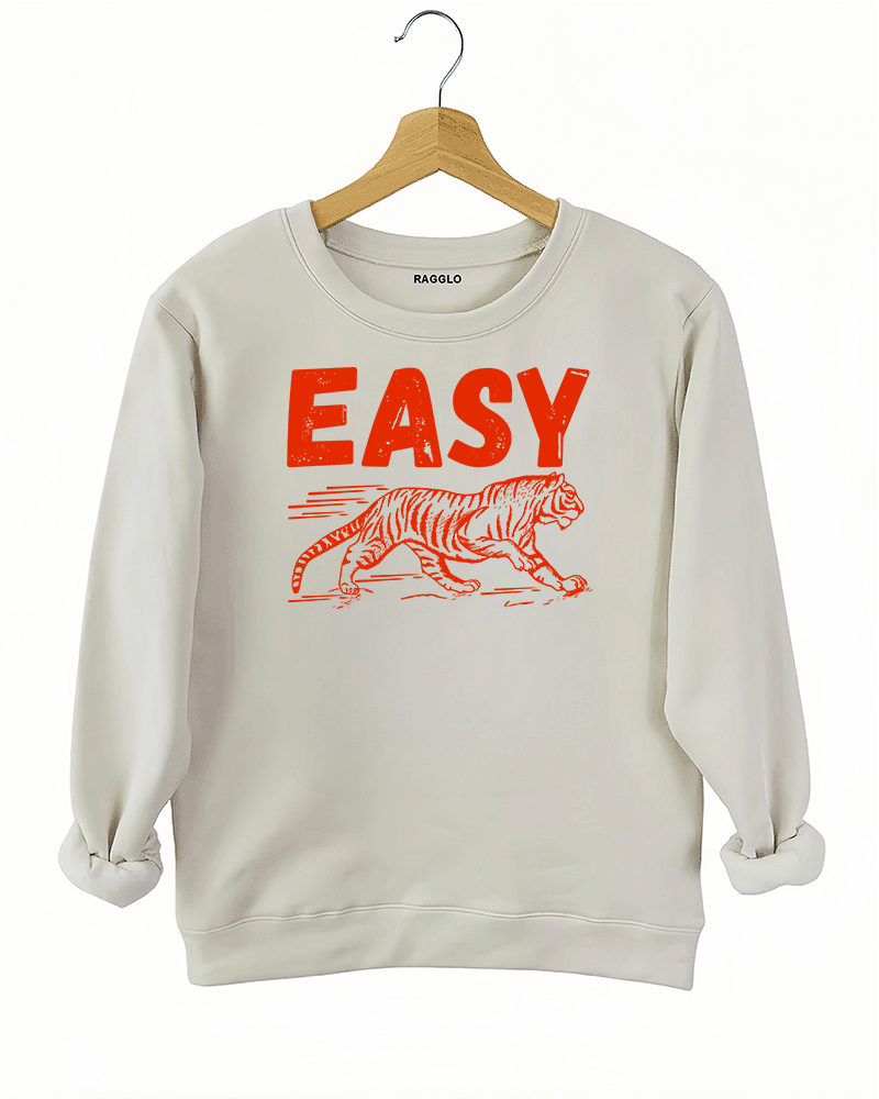 Beige sweatshirt featuring a red 'EASY' text with a tiger walking graphic below, available on Ragglo.