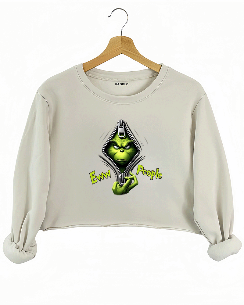 Ragglo beige crop sweatshirt featuring the Grinch peeking out from a zipper with 'Eww People' text, delivering a humorous and playful expression of personality.