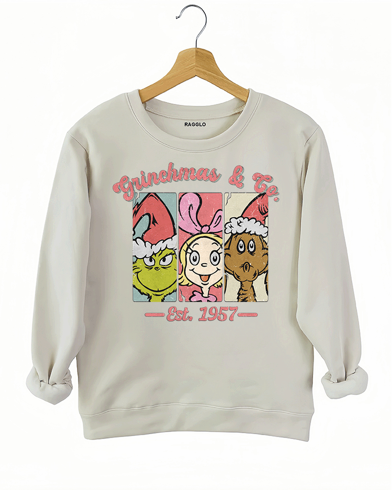 Ragglo beige sweatshirt featuring a classic 'Grinchmas & Co.' design with the Grinch, Cindy Lou Who, and Max, perfect for holiday wear.