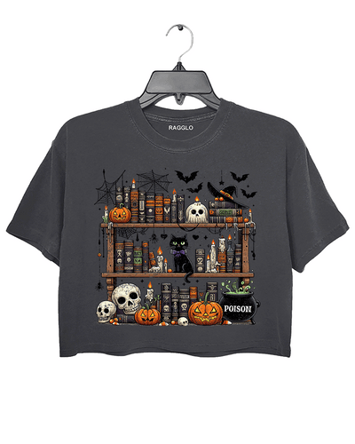 Ragglo gray crop top featuring a Halloween-themed bookshelf with pumpkins, skulls, a black cat, witch hat, potion cauldron, and spooky candles, ideal for spooky fashion and Halloween enthusiasts.