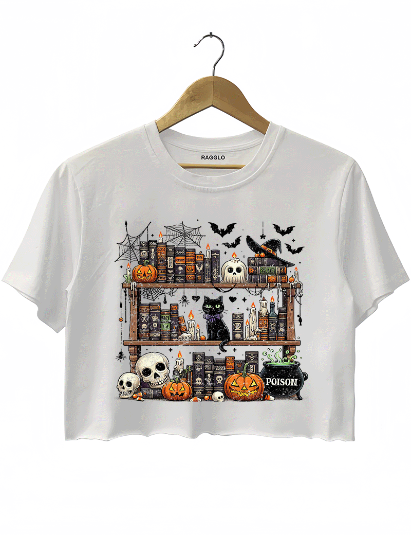 Ragglo white crop top featuring a Halloween-themed bookshelf with pumpkins, skulls, a black cat, witch hat, potion cauldron, and spooky candles, perfect for festive style and Halloween lovers.