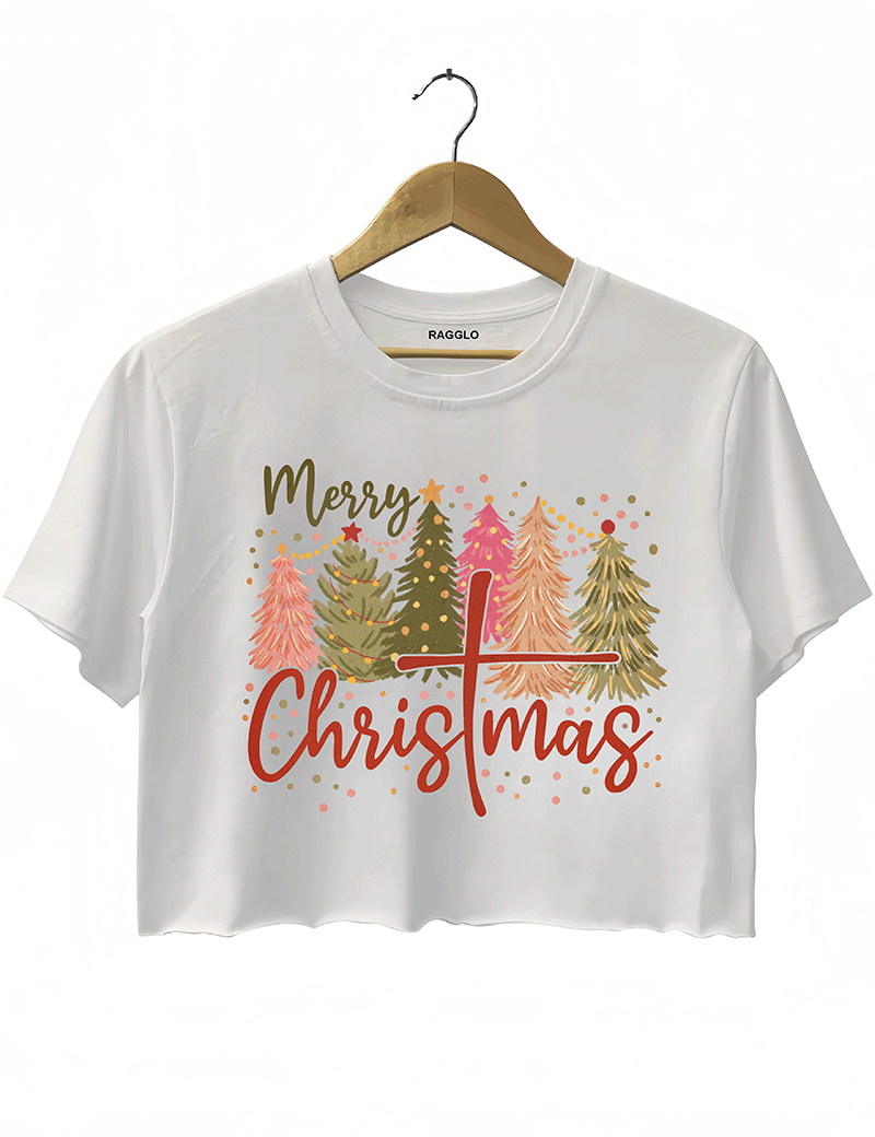 Ragglo white crop top displaying a cheerful 'Merry Christmas' design with pastel-colored Christmas trees and a prominent cross in the word 'Christmas.'