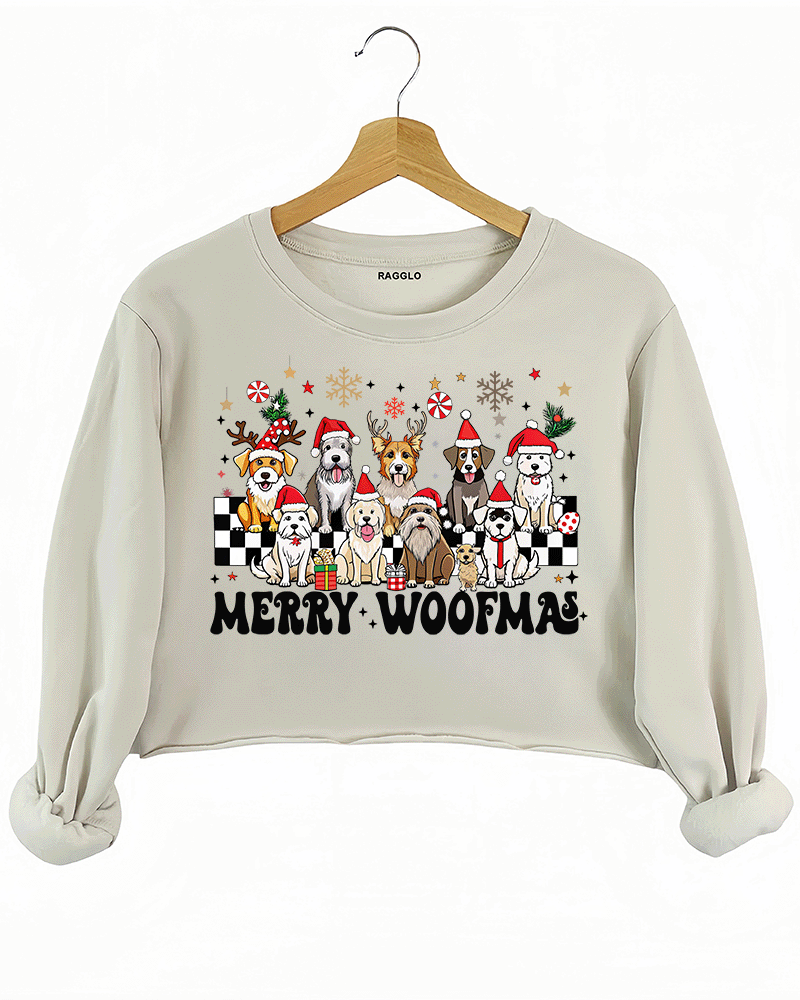 Ragglo beige crop sweatshirt featuring the 'Merry Woofmas' design, showcasing adorable dogs in Santa hats along with holiday decorations like snowflakes and stars.