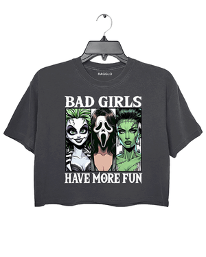 Ragglo dark gray horror-themed cropped t-shirt with "Bad Girls Have More Fun" text and illustrations of three iconic horror characters, ideal for Halloween and horror movie fans.

