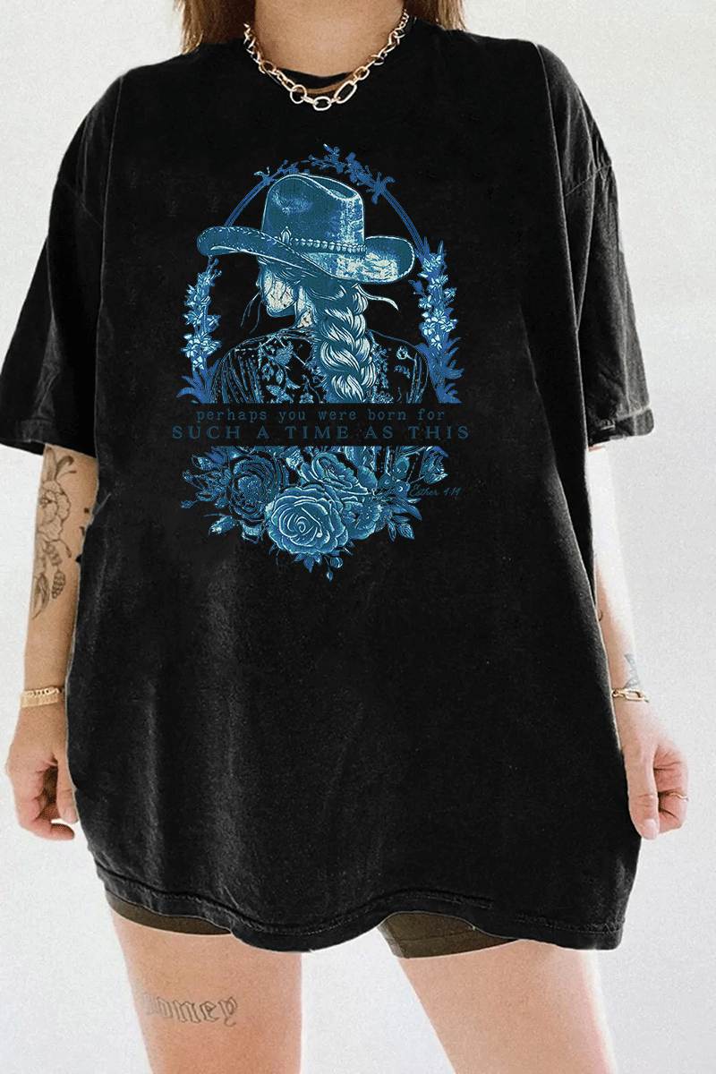 Black Ragglo women's t-shirt with a cowgirl illustration, floral design, and inspirational text 'perhaps you were born for such a time as this' from Esther 4:14, perfect for empowering faith-based fashion.

