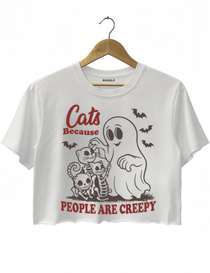 Ragglo white crop top featuring a ghost and three skeleton cats with bats and 'CATS BECAUSE PEOPLE ARE CREEPY' text, perfect for funny Halloween streetwear and cat lovers.

