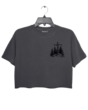 Ragglo dark gray women's crop top front featuring a minimalist design with a cross and trees in a faith-inspired style.