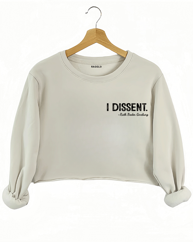 A beige cropped sweatshirt from Ragglo with the text "I DISSENT." and a quote attributed to Ruth Bader Ginsburg on the front.
