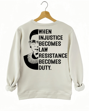 A beige sweatshirt from Ragglo with a silhouette of Ruth Bader Ginsburg and the text "WHEN INJUSTICE BECOMES LAW RESISTANCE BECOMES DUTY." on the back.

