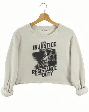 Ragglo beige crop sweatshirt with black 'When Injustice Becomes Law, Resistance Becomes Duty' slogan and Lady Justice design pattern