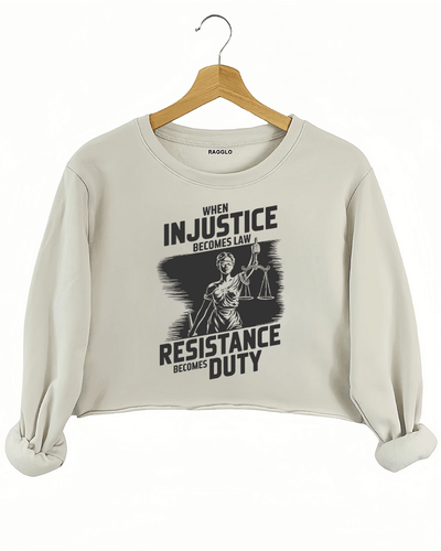 Ragglo beige crop sweatshirt with black 'When Injustice Becomes Law, Resistance Becomes Duty' slogan and Lady Justice design pattern
