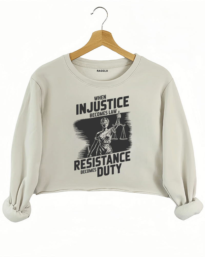 Ragglo beige crop sweatshirt with black 'When Injustice Becomes Law, Resistance Becomes Duty' slogan and Lady Justice design pattern
