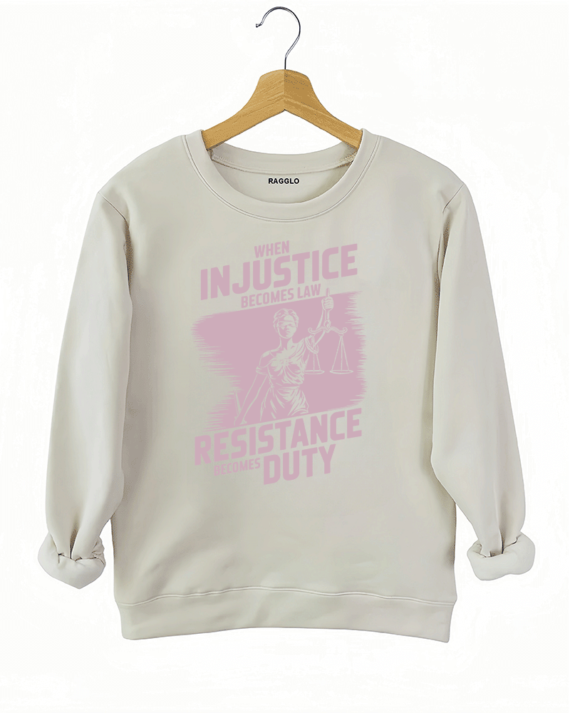 Ragglo beige sweatshirt with light pink 'When Injustice Becomes Law, Resistance Becomes Duty' slogan and Lady Justice design pattern