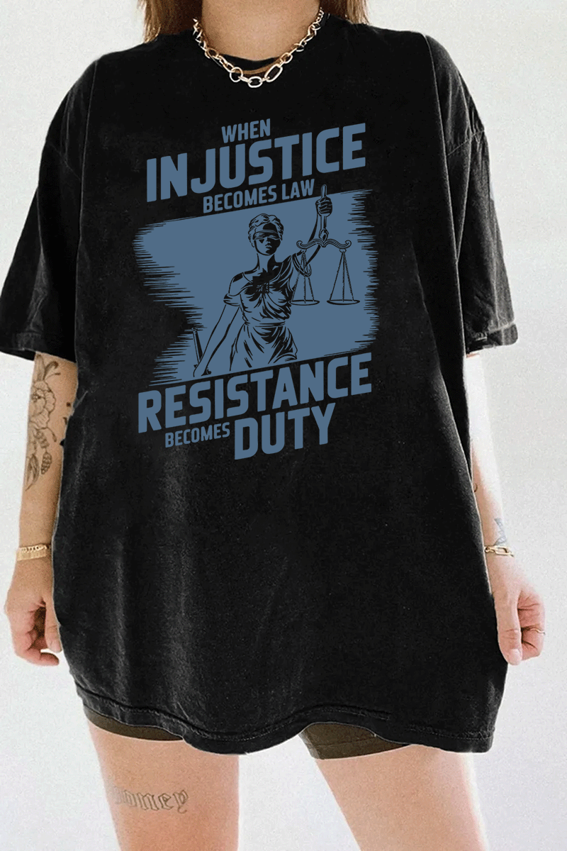 Ragglo black women's tee with light blue 'When Injustice Becomes Law, Resistance Becomes Duty' slogan and Lady Justice design pattern