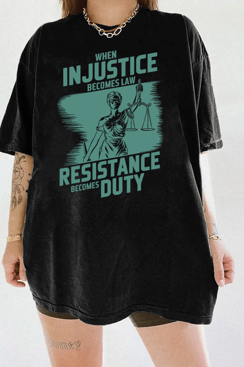 Ragglo black women's tee with ink green 'When Injustice Becomes Law, Resistance Becomes Duty' slogan and Lady Justice design pattern