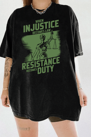 Ragglo black women's tee with olive green 'When Injustice Becomes Law, Resistance Becomes Duty' slogan and Lady Justice design pattern