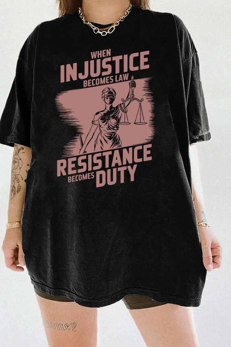 Ragglo black women's tee with rose brown 'When Injustice Becomes Law, Resistance Becomes Duty' slogan and Lady Justice design pattern