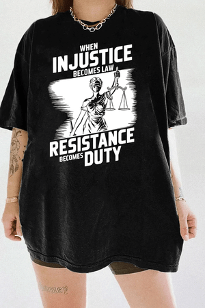 Ragglo black women's tee with white 'When Injustice Becomes Law, Resistance Becomes Duty' slogan and Lady Justice design pattern