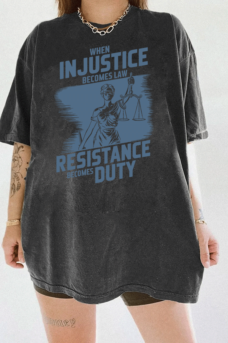 Ragglo dark gray women's tee with light blue 'When Injustice Becomes Law, Resistance Becomes Duty' slogan and Lady Justice design pattern