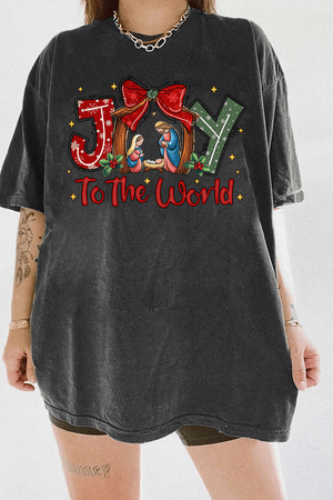 Ragglo dark gray tee featuring 'JOY TO THE WORLD' text with a nativity scene, a red bow, and holly leaves, perfect for religious Christmas streetwear and festive celebrations.





