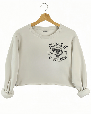Ragglo beige women's crop sweatshirt front featuring a cool duck with sunglasses and the text 'Silence is Golden' in a humorous graphic design