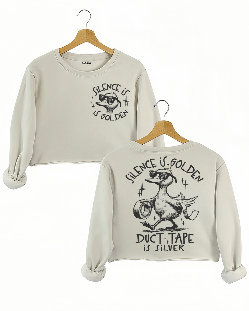 Ragglo beige women's crop sweatshirt featuring a cool duck with sunglasses on both front and back, with 'Silence is Golden' on the front and 'Duct Tape is Silver' with a duck holding duct tape on the back, in a humorous graphic design
