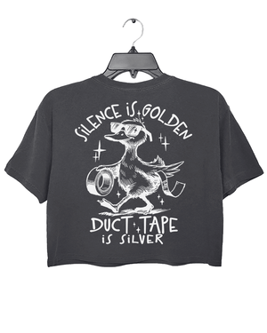 Ragglo dark gray women's crop top back featuring a duck with sunglasses holding duct tape and the text 'Duct Tape is Silver' in a playful graphic design.