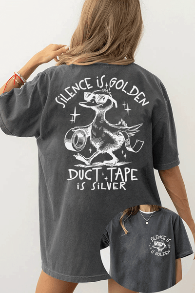 Ragglo dark gray women's T-shirt featuring a cool duck with sunglasses on both front and back, with 'Silence is Golden' on the front and 'Duct Tape is Silver' with a duck holding duct tape on the back, in a humorous graphic design.