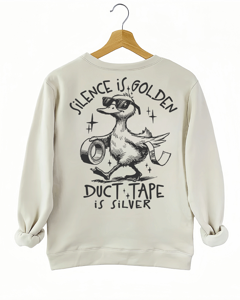 Ragglo beige women's sweatshirt back featuring a duck with sunglasses holding duct tape and the text 'Duct Tape is Silver' in a playful graphic design