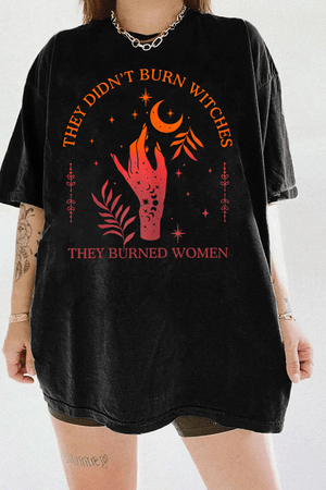 Ragglo black women's T-shirt with 'They Didn’t Burn Witches, They Burned Women' text and flaming hand with mystical symbols graphic.

